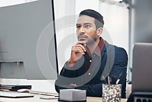 Business, concentration and man at computer thinking or brainstorming ideas for online project. Planning, analytics and