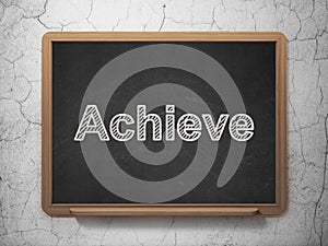Business concept: Achieve on chalkboard background