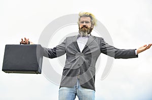 Business concept. bag with money. happy and successful man hold money case. bearded man show office briefcase. good
