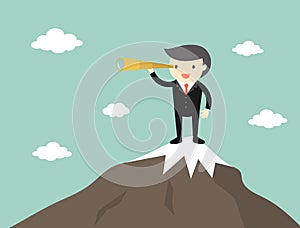Business concept, Boss/Businessman using his telescope while standing on the top of the mountain.