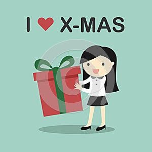 Business concept, Business woman holding a gift box with the words I love X-mas.