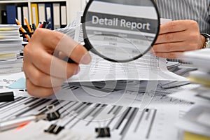 Business concept - businessman working with reports in office, table and workspace close view, analyzing financial data, writes