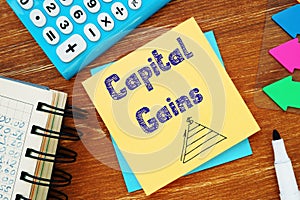 Business concept about Capital Gains with phrase on the page