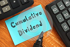Business concept about Cumulative Dividend with inscription on the piece of paper