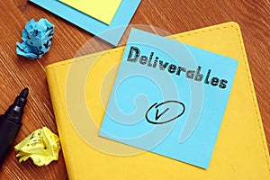 Business concept about Deliverables with inscription on the piece of paper photo