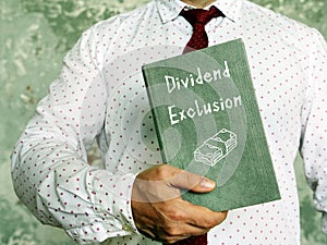 Business concept about Dividend Exclusion with sign on the sheet