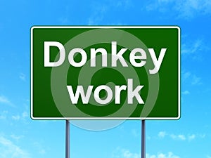 Business concept: Donkey Work on road sign background
