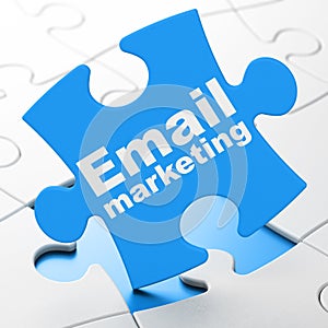 Business concept: Email Marketing on puzzle background