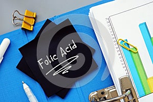 Business concept about Folic Acid  with phrase on the piece of paper