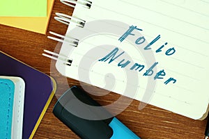 Business concept about Folio Number with sign on the page photo