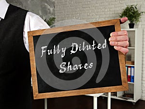Business concept about Fully Diluted Shares with sign on the sheet photo