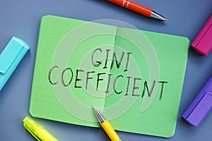 Business concept about Gini Coefficient with sign on the page photo