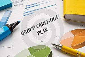 Business concept about GROUP CARVE-OUT PLAN with inscription on the page