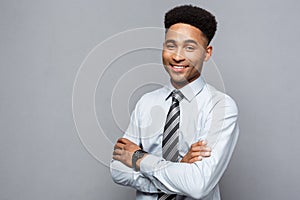 Business Concept - Happy professional african american businessman confident arms crossed.