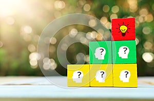 Business Concept image of revealing an idea, finding the right solution during creative process. Hand picking cube with bright