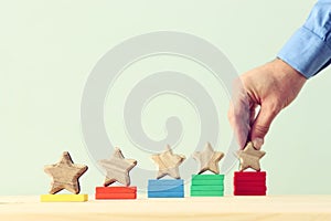 business concept image of setting a five star goal. increase rating or ranking, evaluation and classification idea