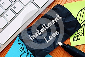 Business concept about Installment Loan with sign on the piece of paper