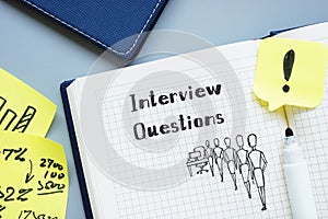 Business concept about Interview Questions with sign on the page