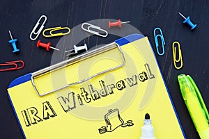 Business concept about IRA Withdrawal with sign on the sheet