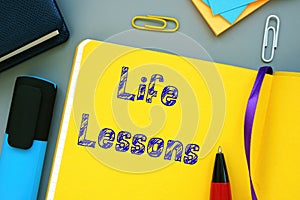 Business concept about Life Lessons with inscription on the sheet