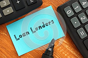 Business concept about Loan Lenders with sign on the sheet