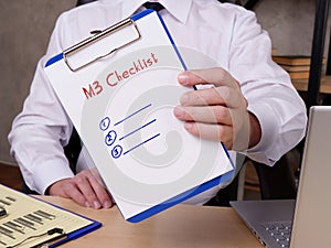 Business concept about M3 Checklist with phrase on the sheet
