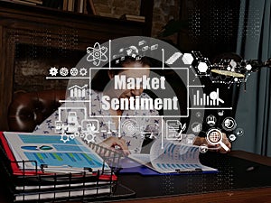 Business concept about Market Sentiment with inscription. Young businesswoman reading paperwork at desk in office on background