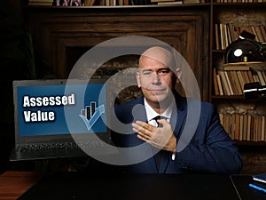 Business concept meaning Assessed Value with inscription on laptop photo