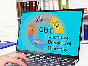 Business concept meaning CBT Cognitive Behavioral Theraphy with inscription on the sheet