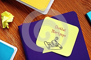 Business concept meaning Chattel Mortgage with sign on the piece of paper