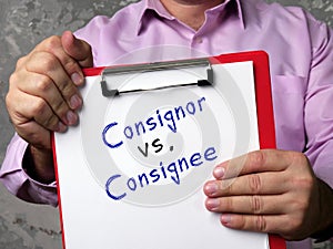 Business concept meaning Consignor vs. Consignee with phrase on the piece of paper