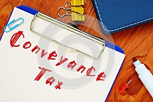 Business concept meaning Conveyance Tax with inscription on the sheet photo