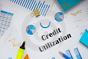 Business concept meaning Credit Utilization with sign on the piece of paper