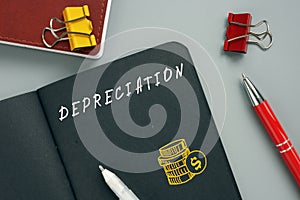 Business concept meaning DEPRECIATION with phrase on the page. An accounting method of allocating the cost of a tangible asset