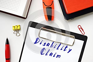 Business concept meaning Disability Claim with inscription on the piece of paper