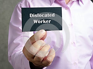 Business concept meaning Dislocated Worker with inscription on the piece of paper