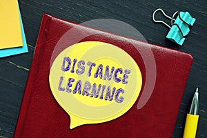 Business concept meaning DISTANCE LEARNING with sign on the sheet