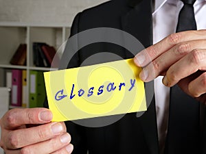 Business concept meaning Glossary  with phrase on the piece of paper