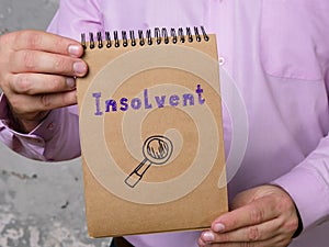 Business concept meaning Insolvent with phrase on the page