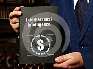 Business concept meaning Interpersonal Intelligence with phrase on the black notepad