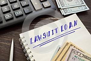 Business concept meaning LAWSUIT LOAN with sign on the page