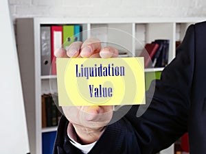 Business concept meaning Liquidation Value with inscription on the sheet