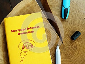 Business concept meaning Mortgage Interest Deduction with phrase on the piece of paper