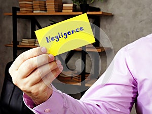 Business concept meaning Negligence  with sign on the piece of paper