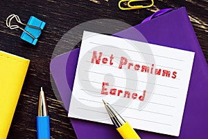 Business concept meaning Net Premiums Earned  with inscription on the sheet