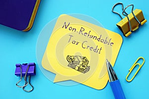 Business concept meaning Non-Refundable Tax Credit with sign on the page