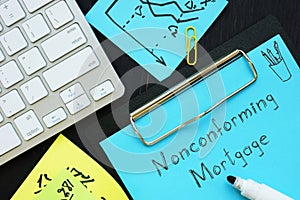 Business concept meaning Nonconforming Mortgage with sign on the page