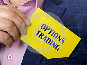 Business concept meaning OPTIONS TRADING with inscription on the sheet