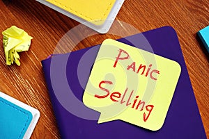Business concept meaning Panic Selling with phrase on the piece of paper