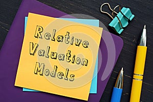 Business concept meaning Relative Valuation Models with sign on the page